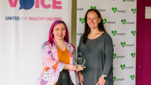 Alice Pryor awarding VicHealth their trophy at the Fame & Shame Awards 2020